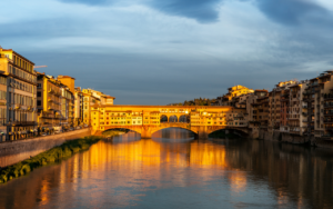 Ponte Vecchio and Arno River in Florence seen from Ponte Santa Trinita at sunset