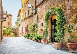 Street with ancient buildings in Pienza, Tuscany, Italy