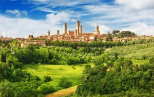 Panorama-of-San-Gimignano-and-vineyards-around this Italian city that deserves to be in a tuscanay travel itinerary