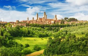 Panorama-of-San-Gimignano-and-vineyards-around this Italian city that deserves to be in a tuscanay travel itinerary