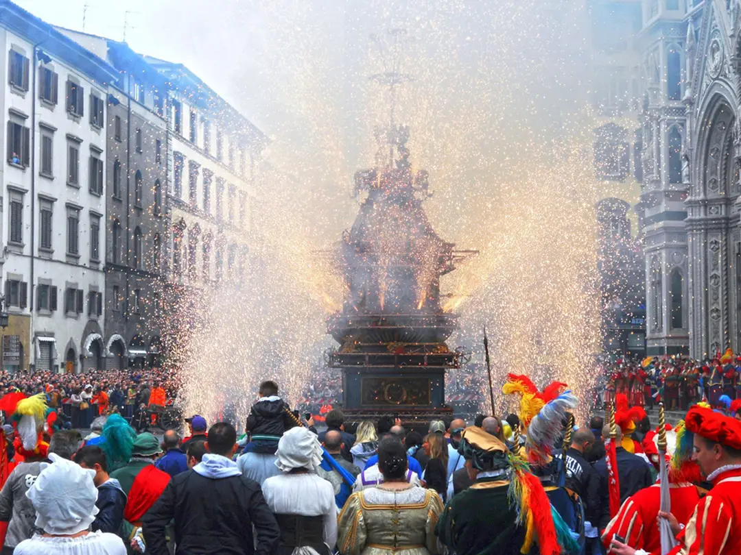 Crowd watching the explosion of the pyrotechnic cart in front of the Florence Duomo during the Scoppio del Carro on Easter
